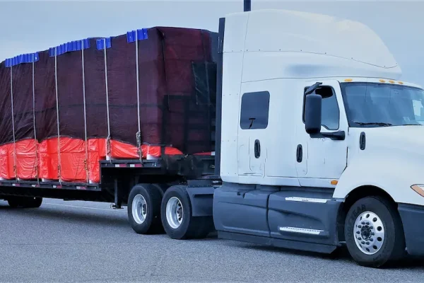 trucking-covered-load-2026-03-24-05-31-49-utc